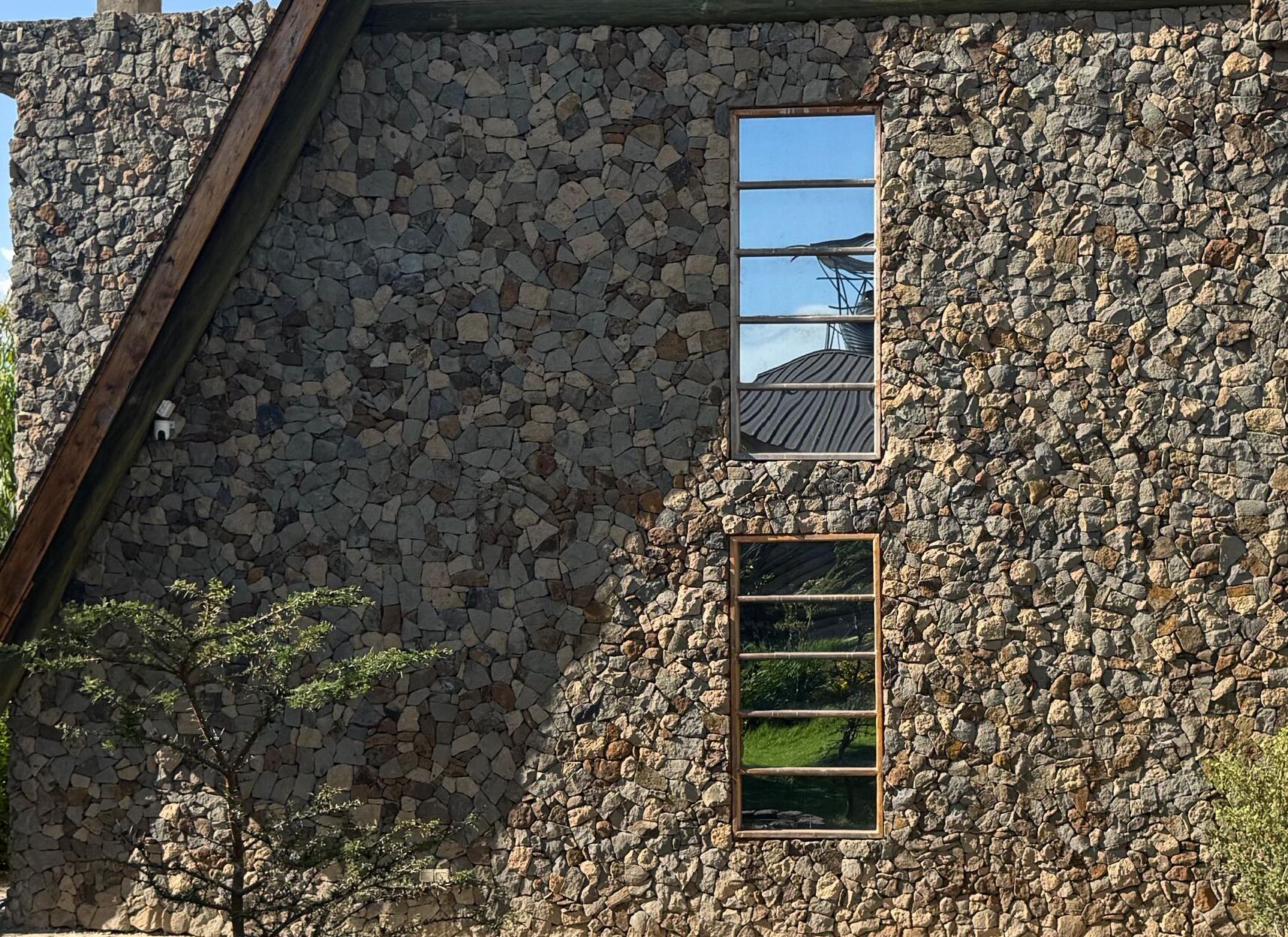 Hand-laid stone wall of the A-frame